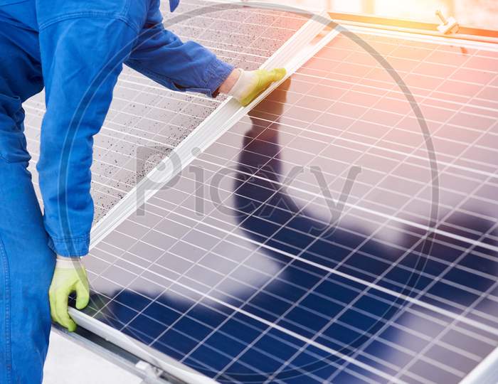 A man working on solar panels