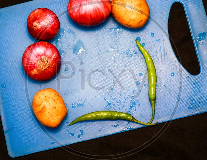 Vegetables In A Steel Bowl With Black Background