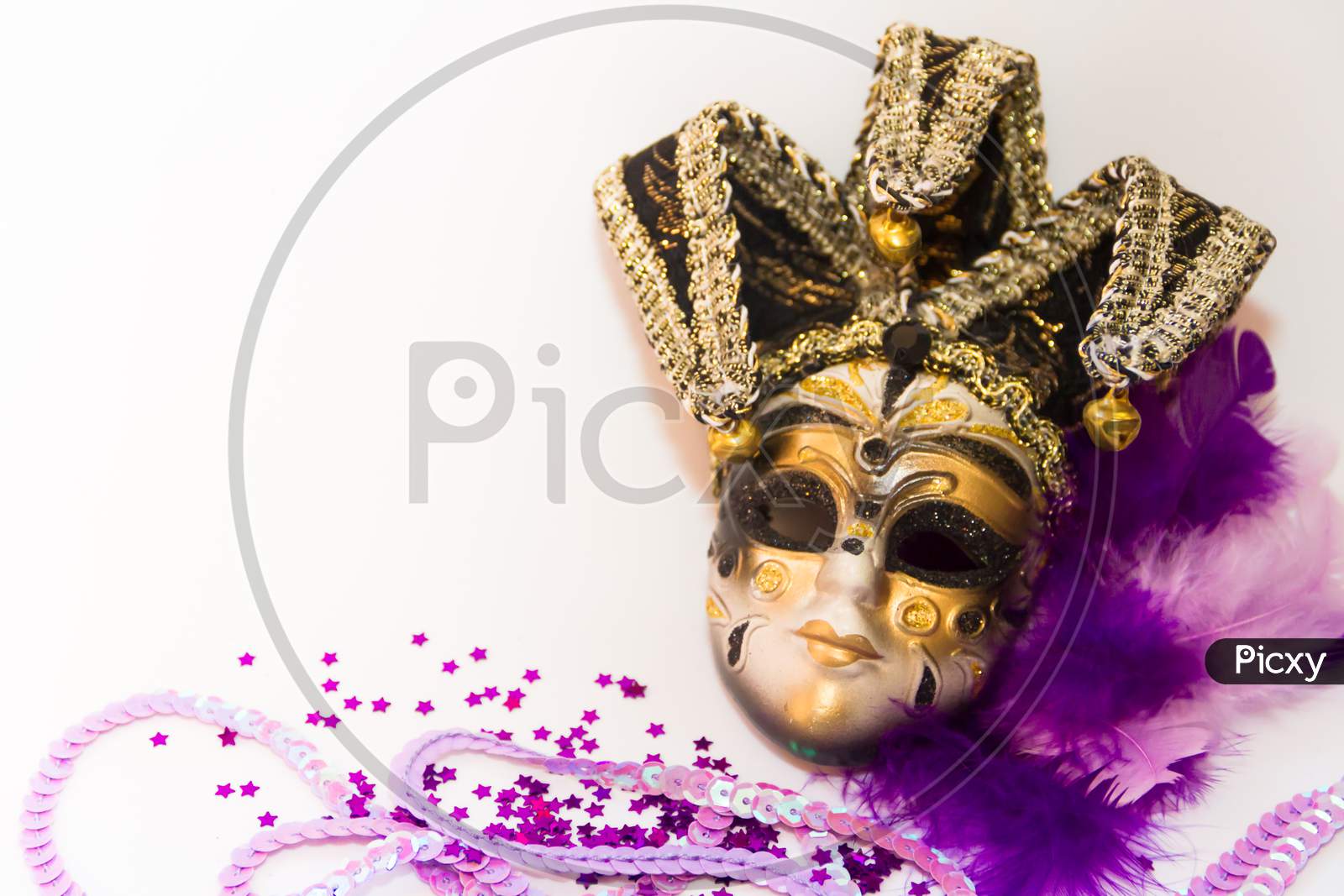 Masks And Feathers Of Venice Carnival On White Background