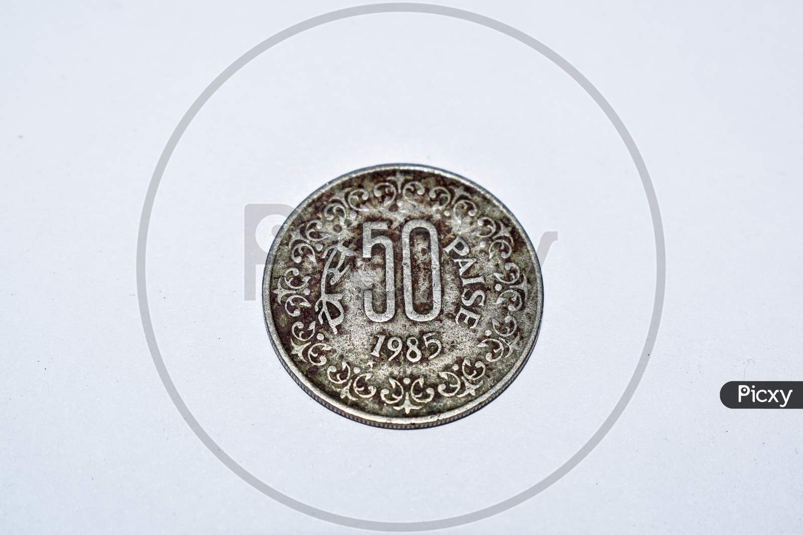 Old Indian 50 Paise Coin. Year 1985 Vintage Coin. White Background.