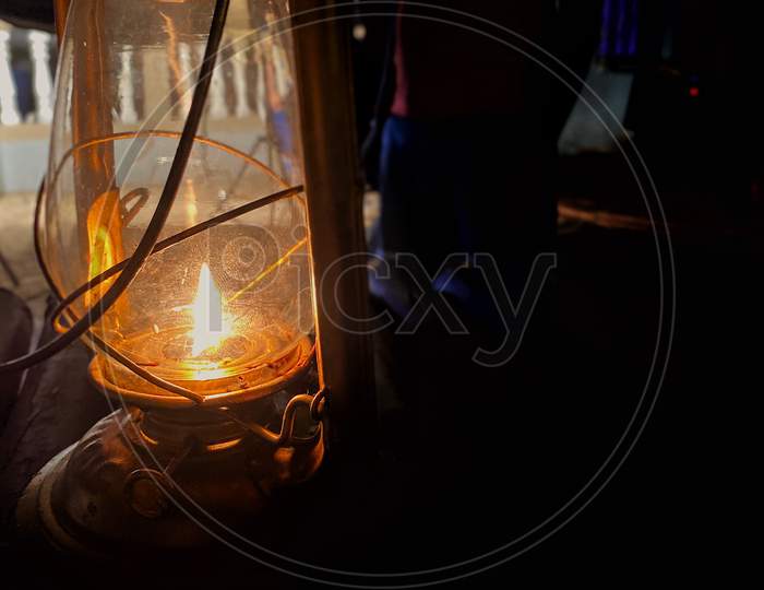 Oil Lantern In A Dark Night