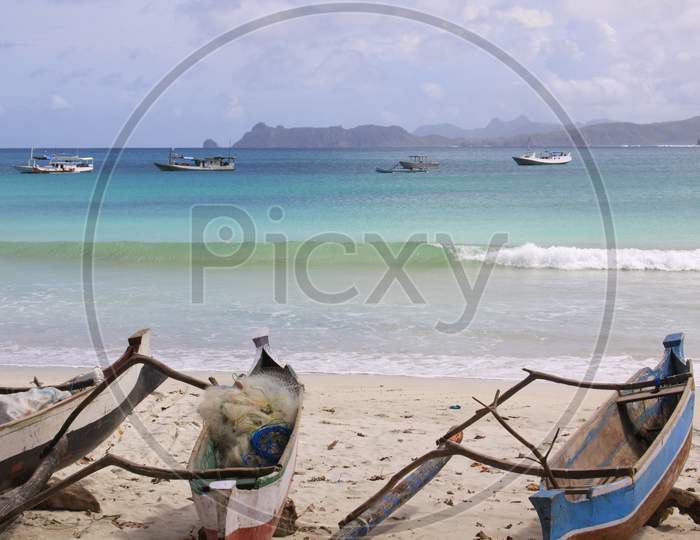 Small Fishing Canoes At Mawun Beach, Lombok
