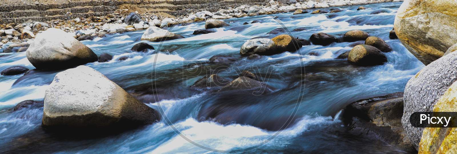 Long Exposure Of Fast Flowing River