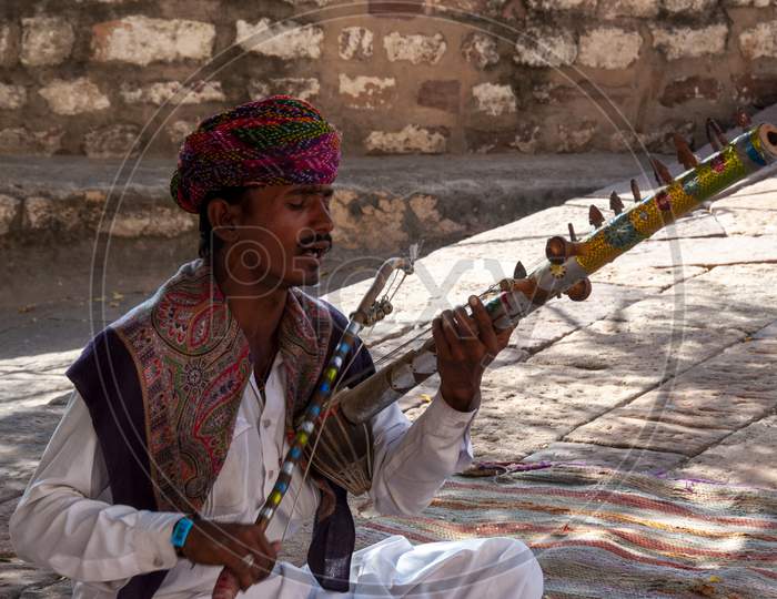 A Musicians Playing Ravanahatha At Mehrangarh Fort Of Jodhpur Rajasthan