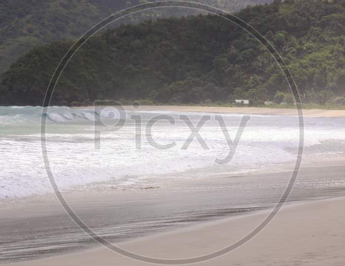 Breaking Surf Waves At Mawun Beach Lombok