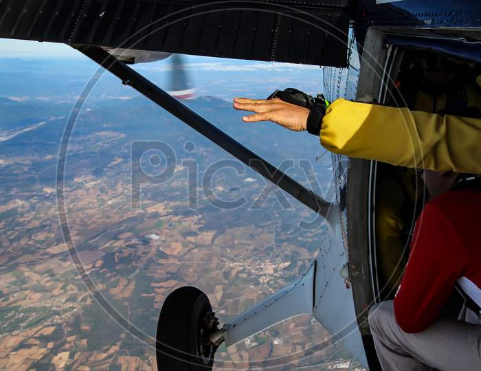 Man Poses For Skydiving In Plane Before Jump.