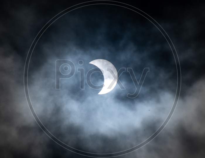 Partial Annular Solar Eclipse amid dark clouds seen in Hyderabad on June 21,2020.