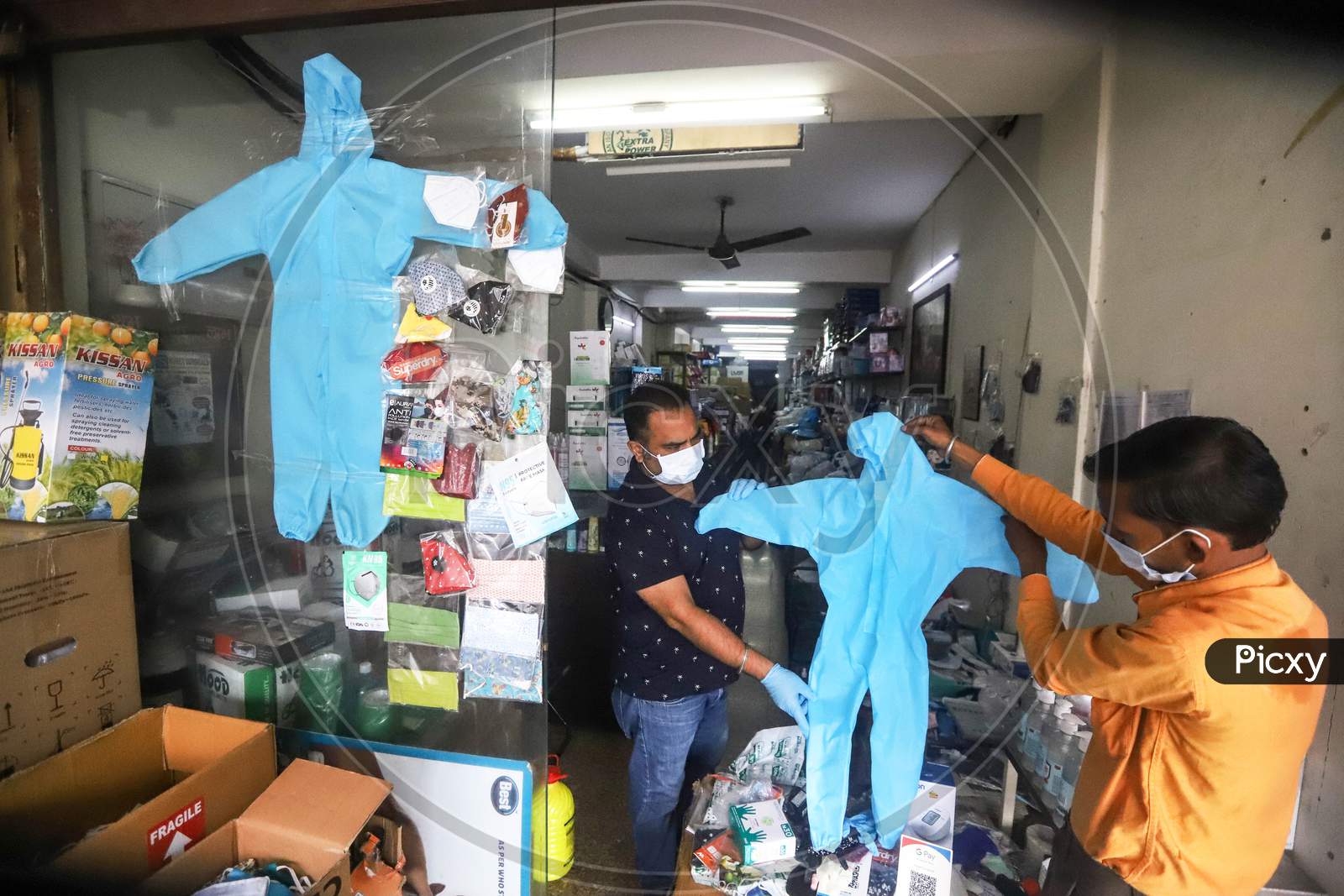 Parents were seen buying PPE kits for their children from a store in New Delhi, India on June 20, 2020.