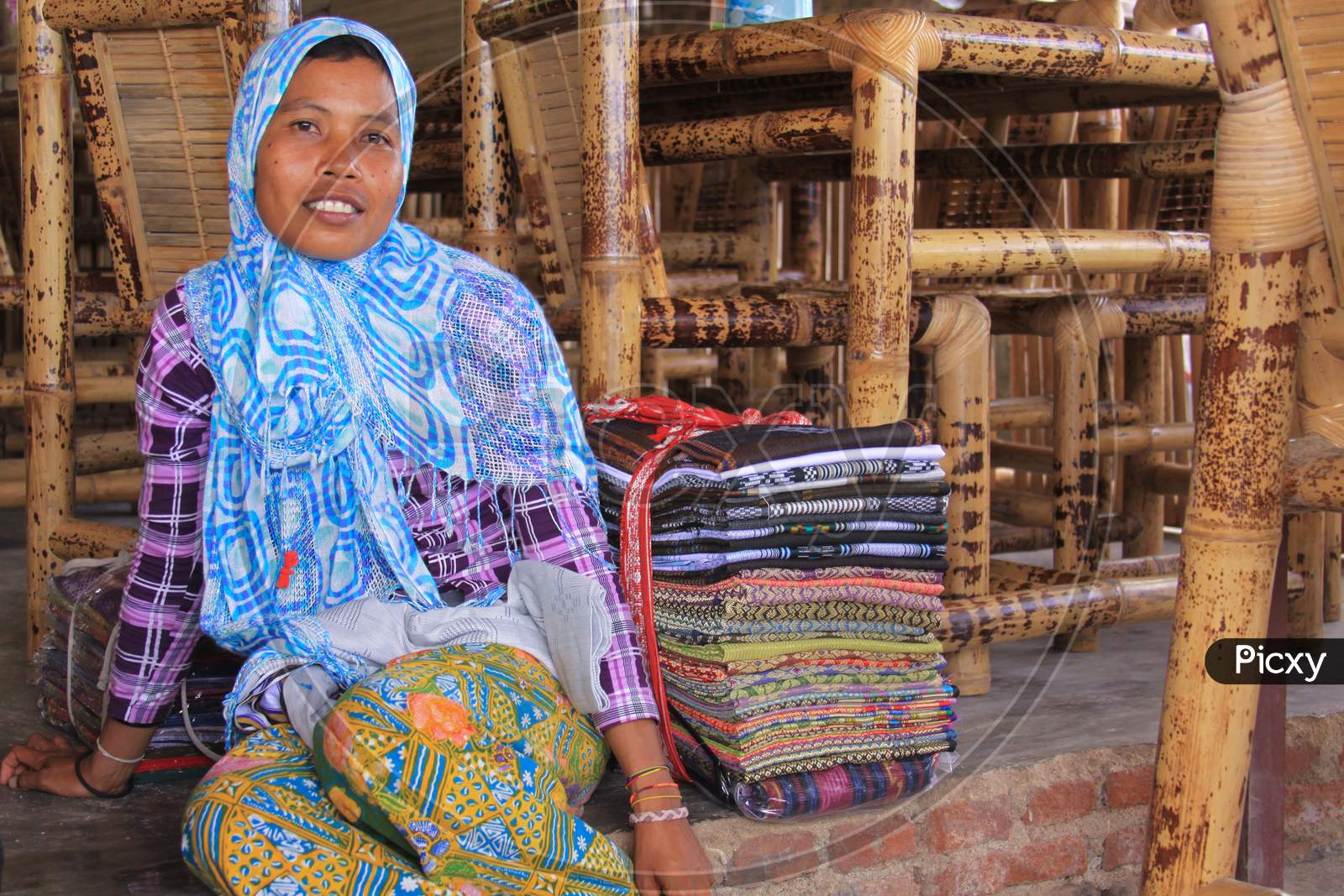 Sasak Woman From Village Selling Batik In Lombok