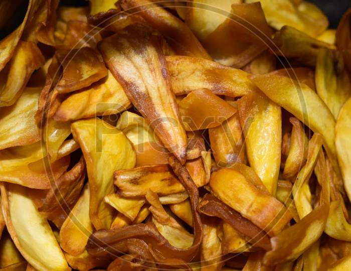 Close Up Shot Of Fried Jackfruit Chips. South Indian Cuisine. Jackfruit Chips Fried In Coconut Oil.