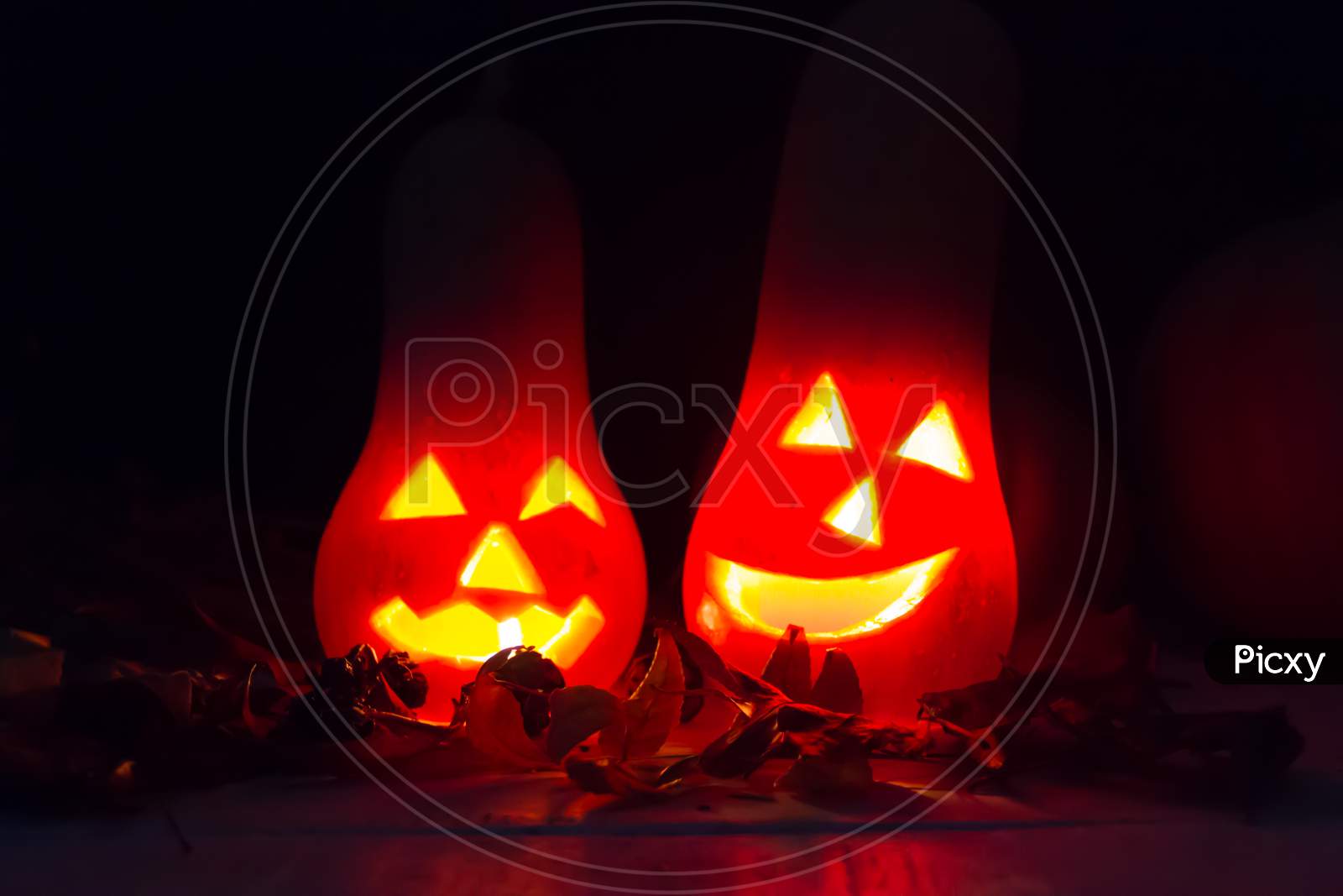 Halloween Candles And Pumpkins In The Dark