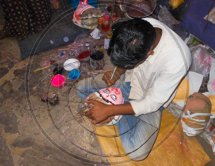 Mask Maker Of Purulia Busy With His Work