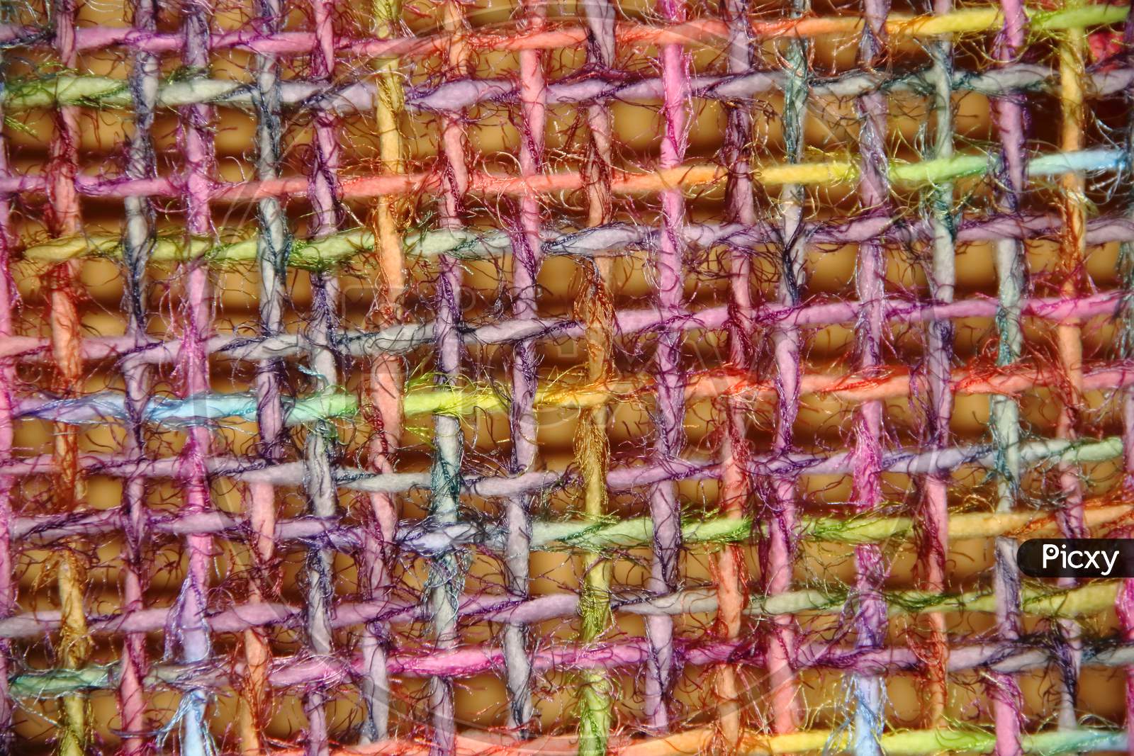 Colorful Yarns Woven In Loom Frame By Hand