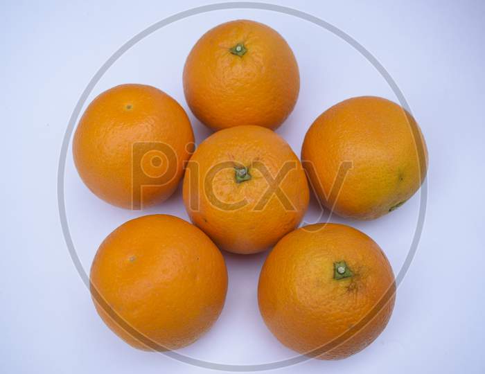 Mandarin Fruit Heap On White Background. Fresh Fruits From India Asia