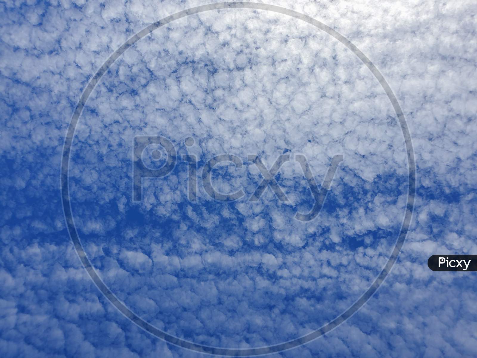 Clouds Texture Pattern In Sunny Sky Background