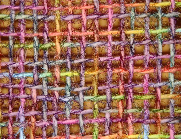 Colorful Yarns Woven In Loom Frame By Hand