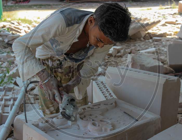 A Stone sculpture artist at Jain temple in Parasnath/Jharkand/India.