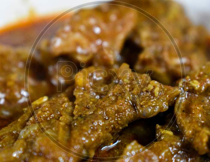 South Indian Cuisine Kerala Style Beef Curry / Roast. Traditional Style Meat Curry. Indian Spicy Curry. Selective Focus Photograph.