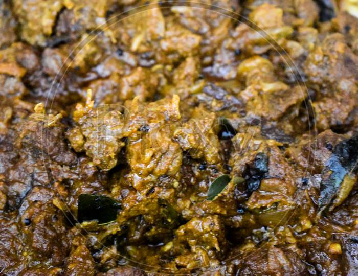 South Indian Cuisine Kerala Style Beef Curry / Roast. Traditional Style Meat Curry. Indian Spicy Curry. Selective Focus Photograph.