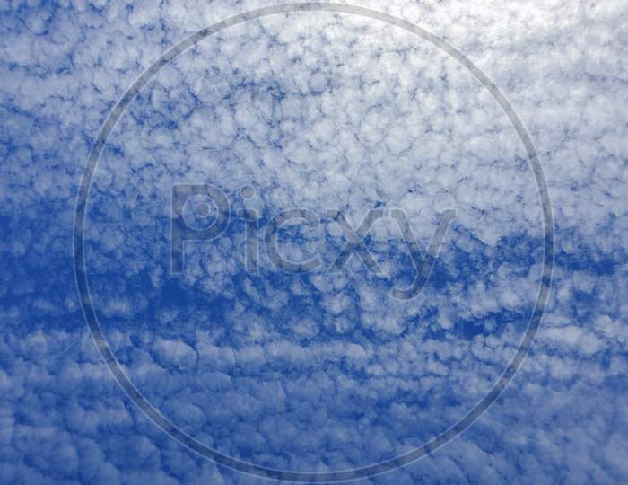 Clouds Texture Pattern In Sunny Sky Background
