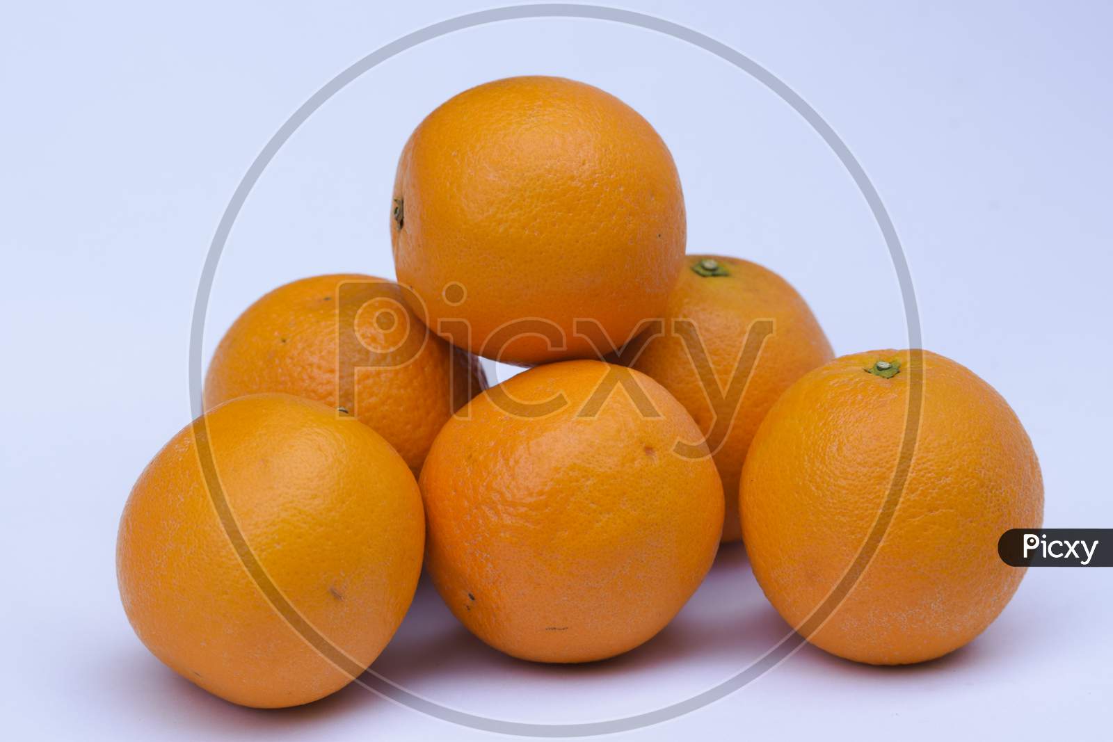 Tangerine Fruit Heap On White Background. Fresh Fruits From India Asia