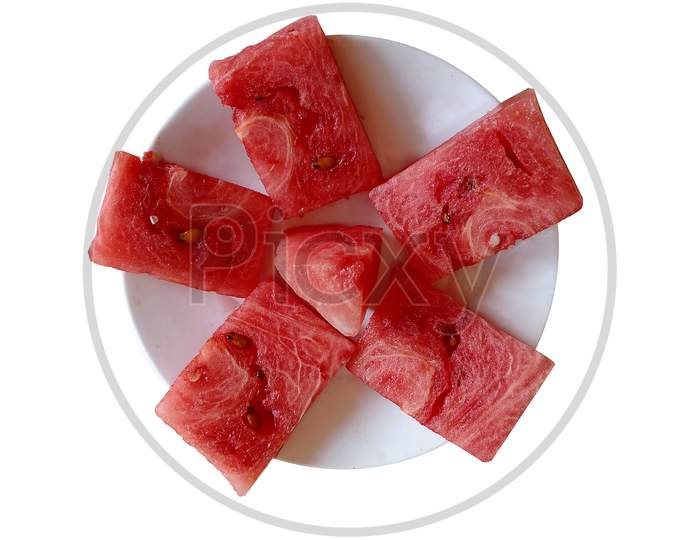 fresh red watermelon pieces on the plate, white background.