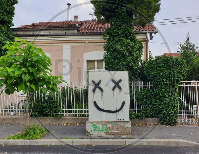Smiley Face Graffiti Painted Art In Cluj-Napoca