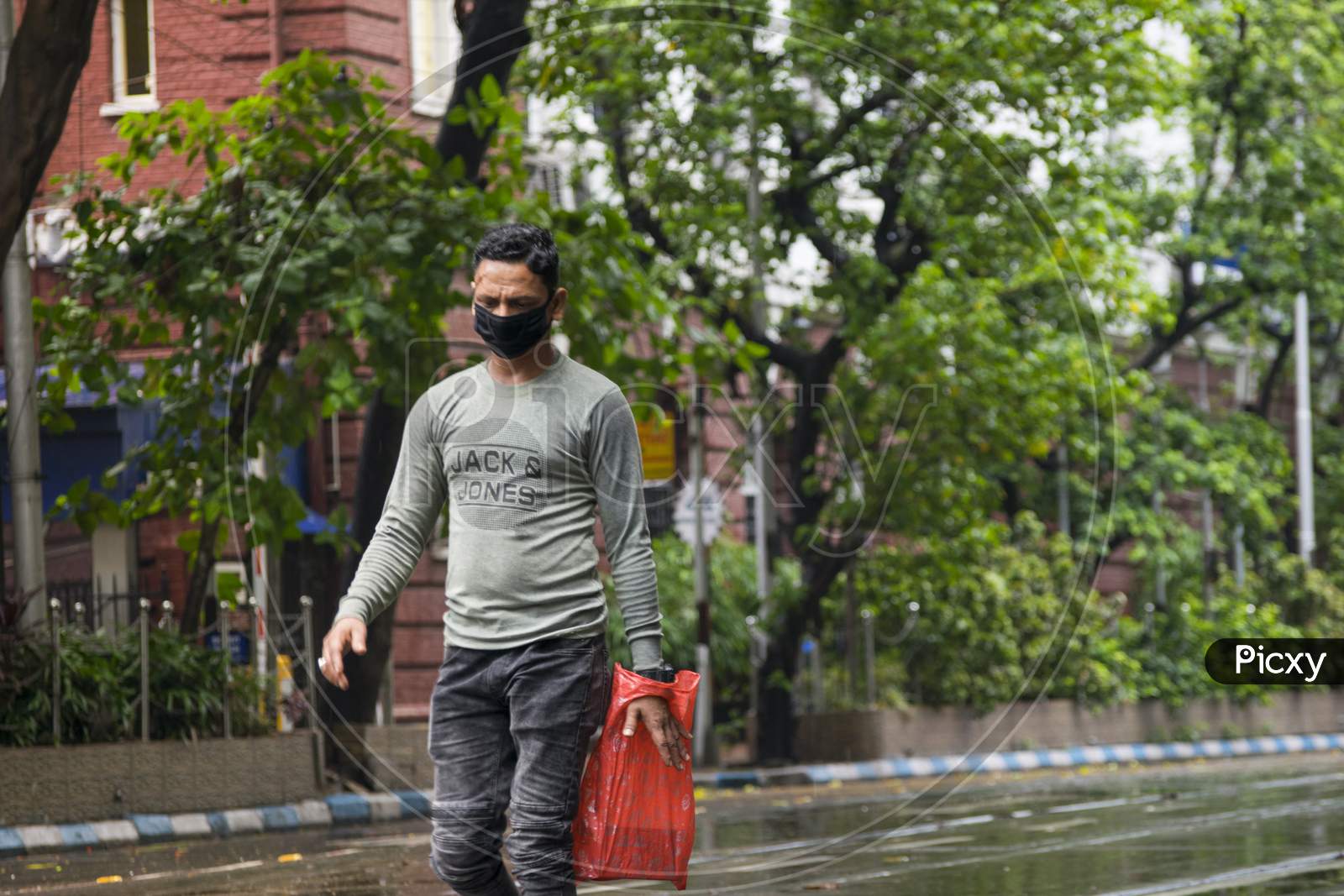 Masked face people walking on street in Kolkata Police Headquarters on 21st June 2020