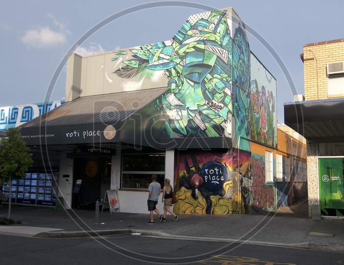 Beautiful Street View Of Boundary St. And Mural On A Building