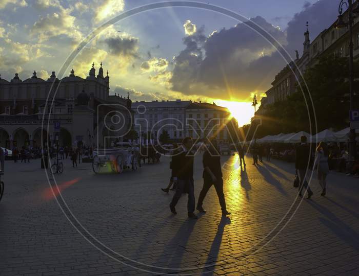 Krakow, Poland - May 23, 2014: A Wide Angle Street View Of Touristic Main Square At The Center Of Krakow City In Poland