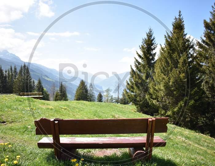 Empty bench on a hill in Switzerland 17.5.2020