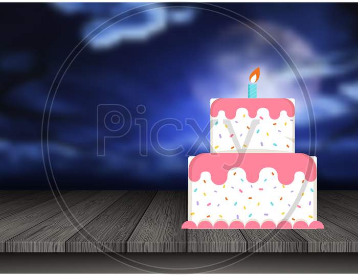 Birthday Cake Is Placed On The Table At Night