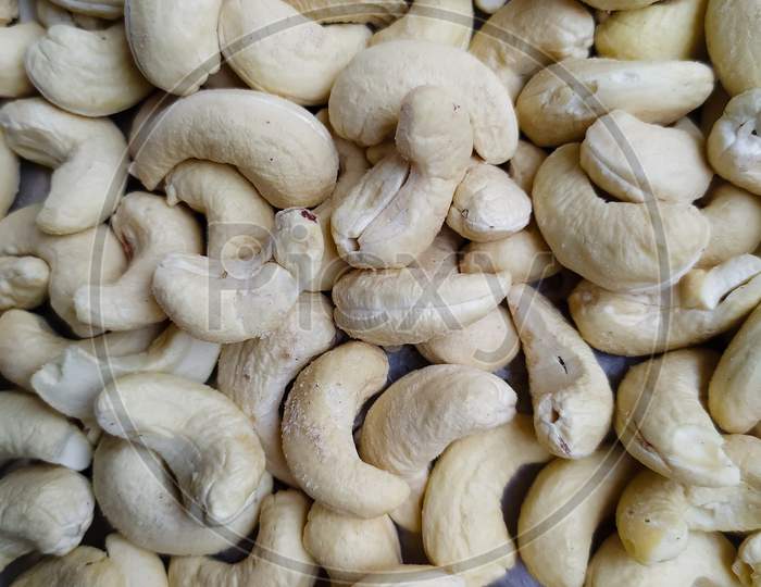 Background texture of cashew nuts, topview
