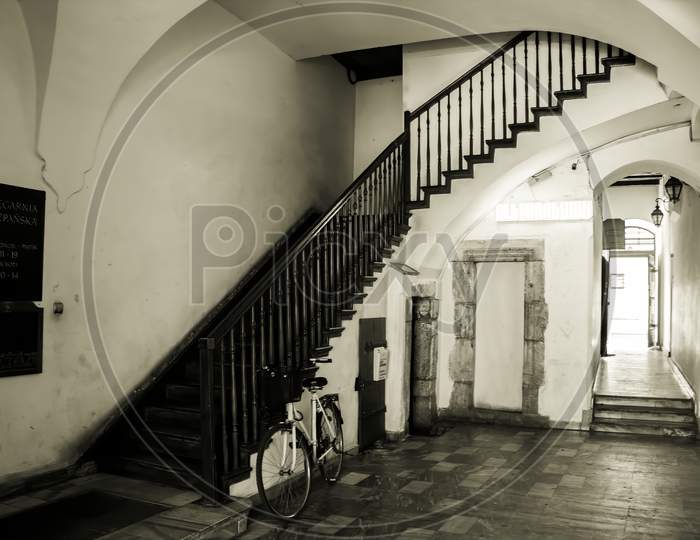 Interior Of A Bicycle And Stairs In One Of The Building Located In Krakow City Center, Poland, Europe