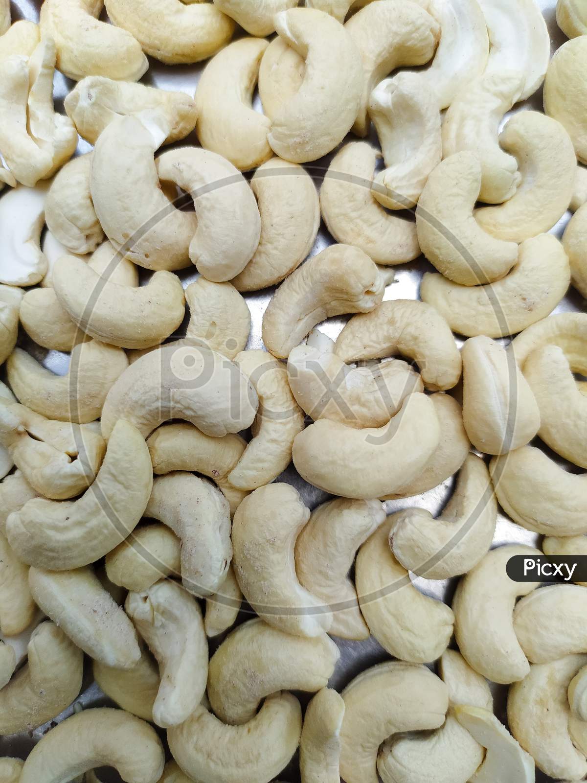 cashew nuts as a background texture, topview