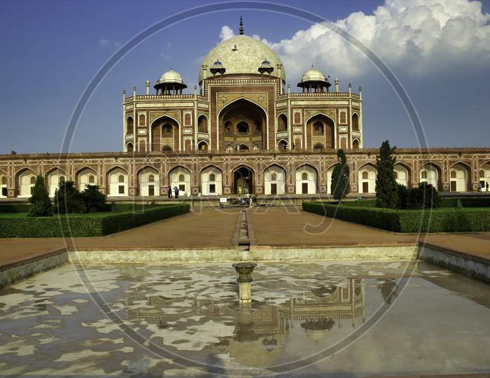 Artistic Perspective Of Humayun Tomb Architecture Against A Blue Sky Located In New Delhi, India