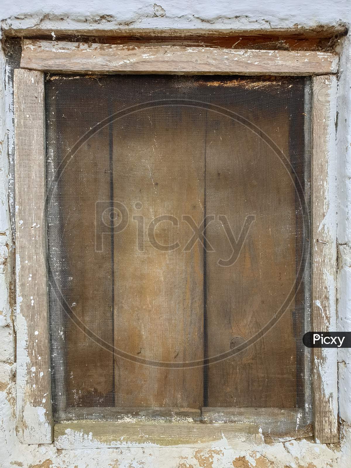 Photo of wooden window of old Indian house with selective focus, selective focus on subject, background blur