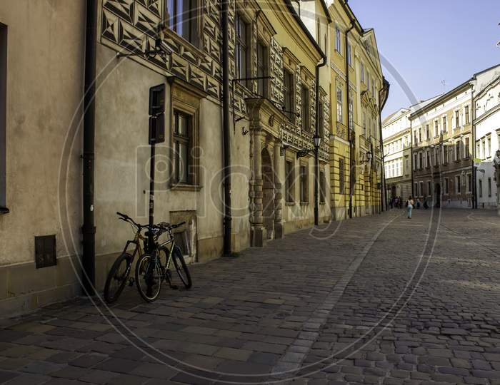 A Bicycle And European Architecture Street View In Krakow City, Poland, Central Europe