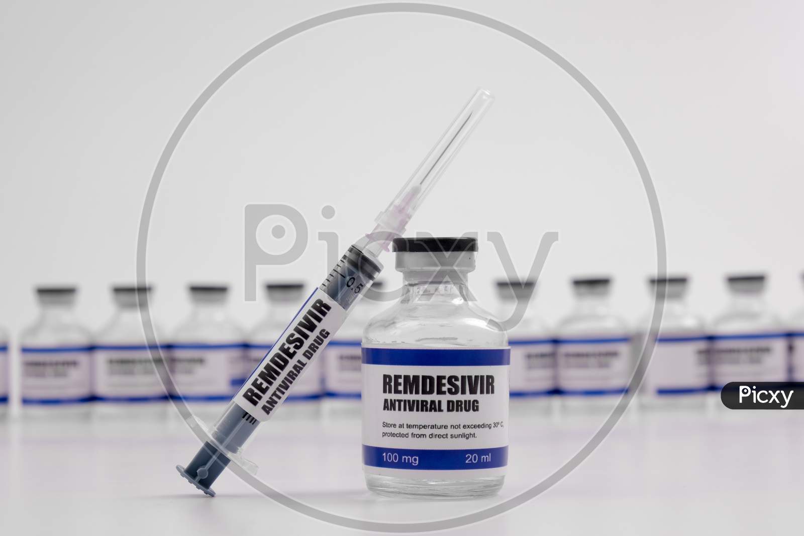 Remdesivir Antiviral Injectable Drug Vaccine Medicine Vial Covid-19 Corona Virus 2019-Ncov Syringe Injection. Vaccination, Immunization, Treatment To Cure Covid 19 Corona Virus Disease Medical Concept