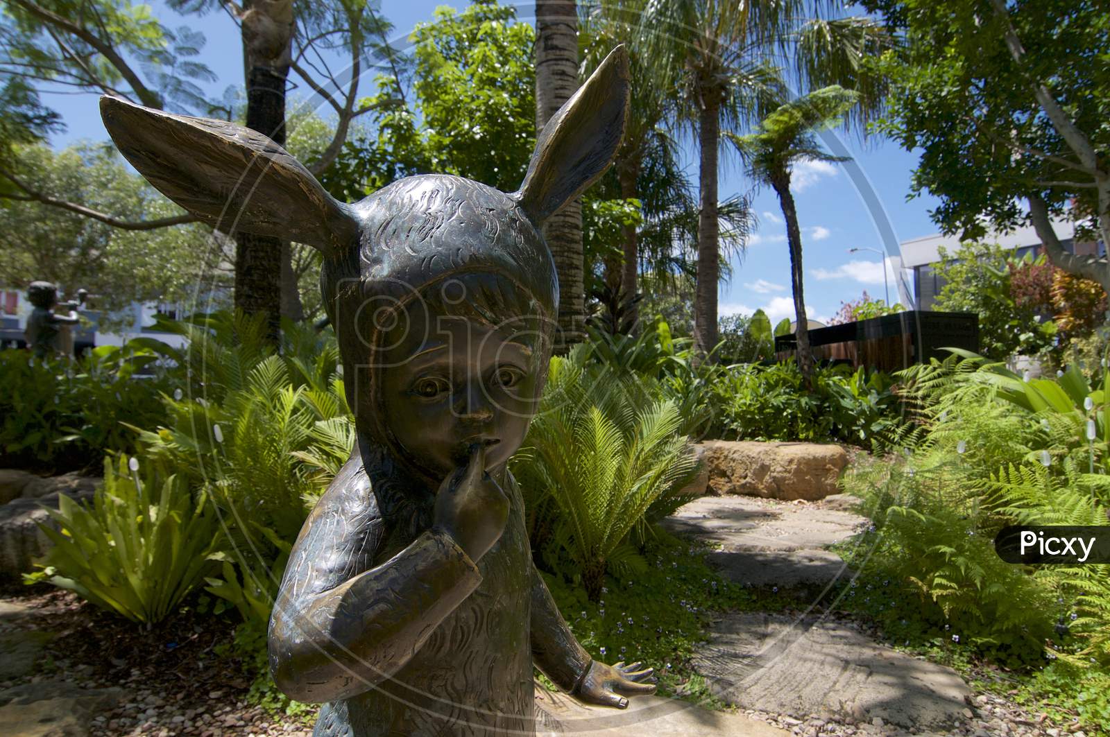Alice In Wonderland Style Child Statue In West Village Park In West End, Brisbane