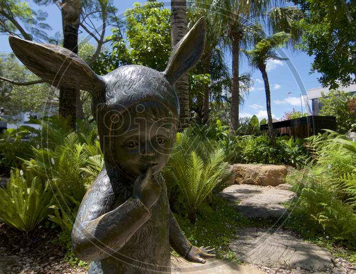 Alice In Wonderland Style Child Statue In West Village Park In West End, Brisbane