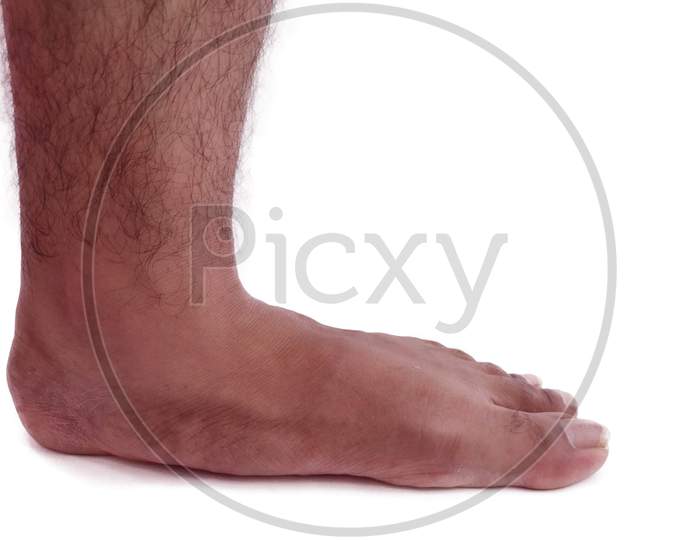 Man bare feet with hairs lateral view stand on white background Isolated