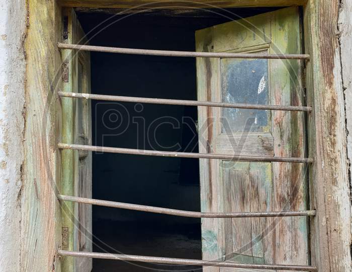Photo of wooden window of old Indian house