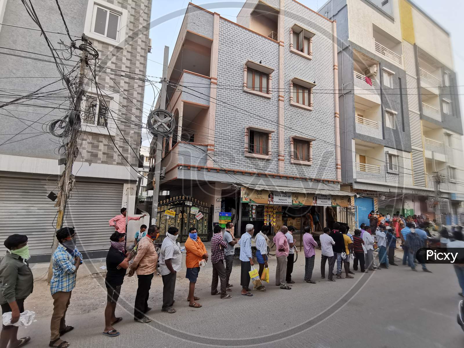 People lined up in queue for Ration