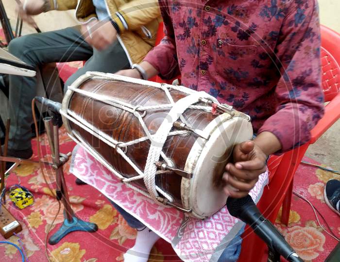 Hisar, Haryana, February 2020 : Hindu Man Play Drums,A Musical Instrument In A Religious Gathering