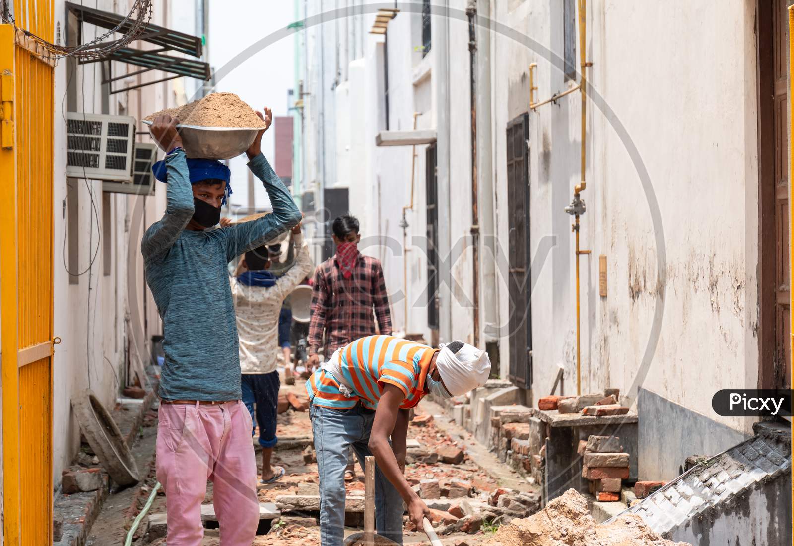 Indian labor with Medical Mask at Construction Site during Unlock down India
