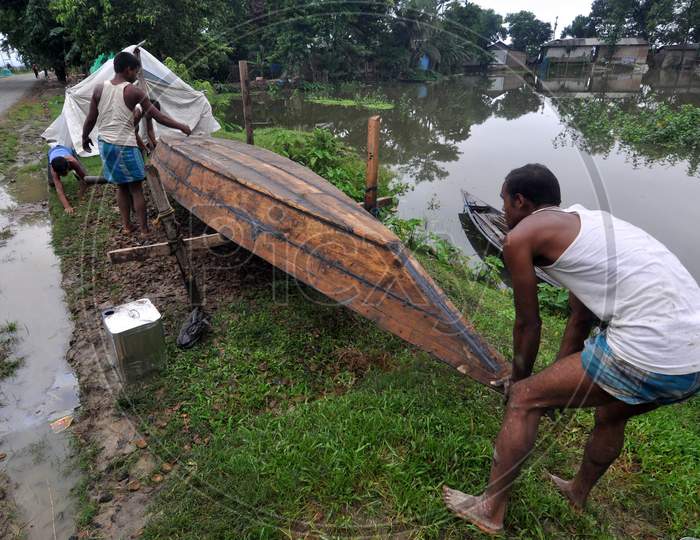 Carpenter Making A Boat At A Flood Affected Village In The Morigaon District Of Assam On June 25,2020.