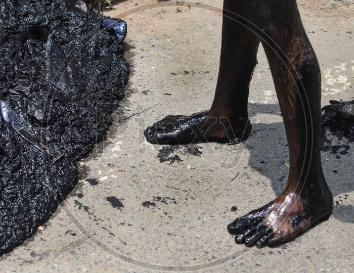 An Indian Manual Scavengers Cleans A Choked Drain, In New Delhi On March 23, 2020.