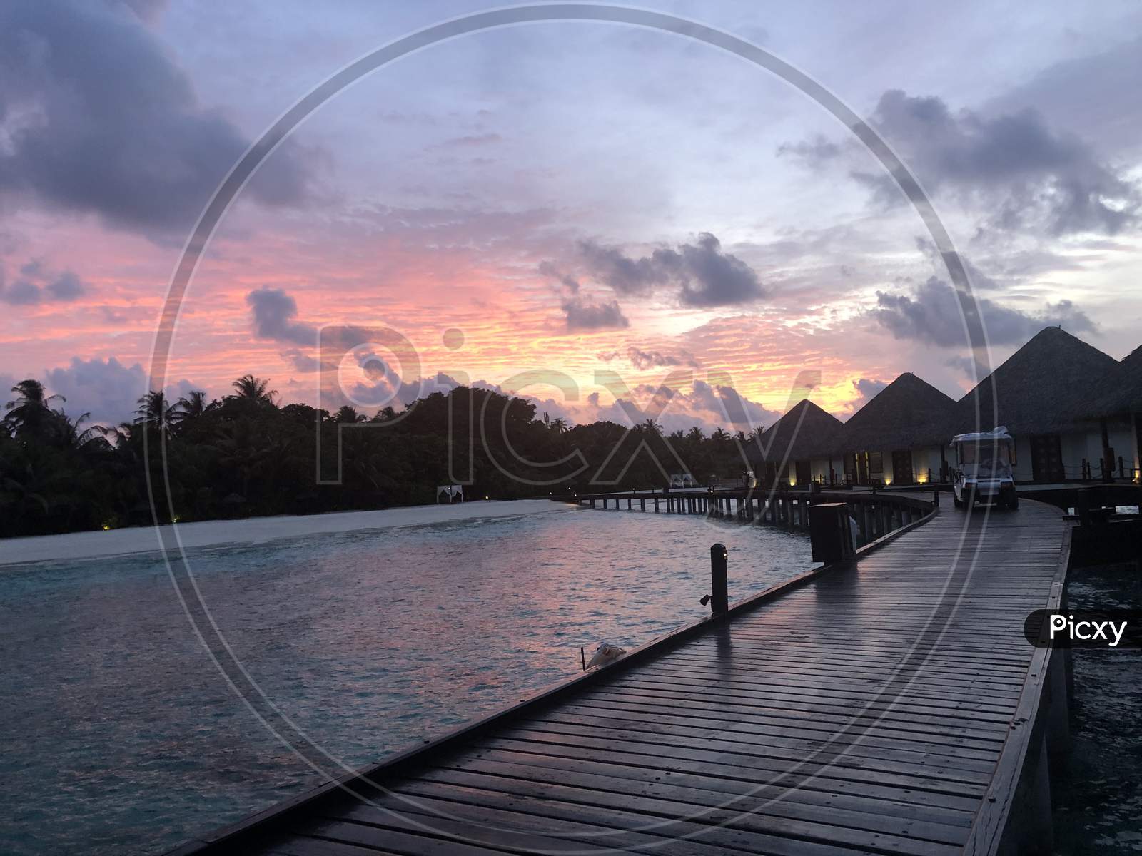 Sunset water villa in Maldives