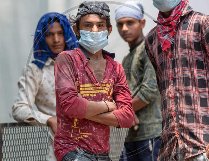 Indian labor with Medical Mask at Construction Site during Unlockdown India